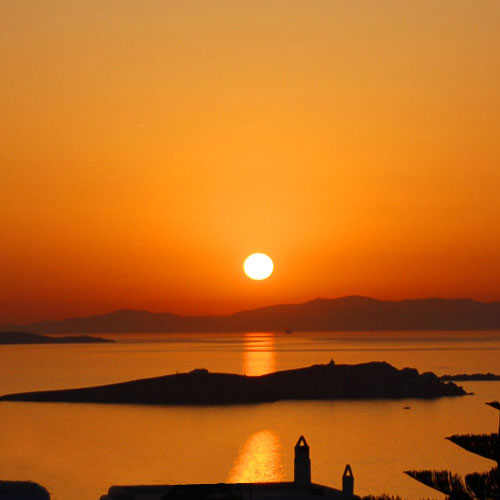 Enjoy the enchanting sunset from our Mykonos Rooms